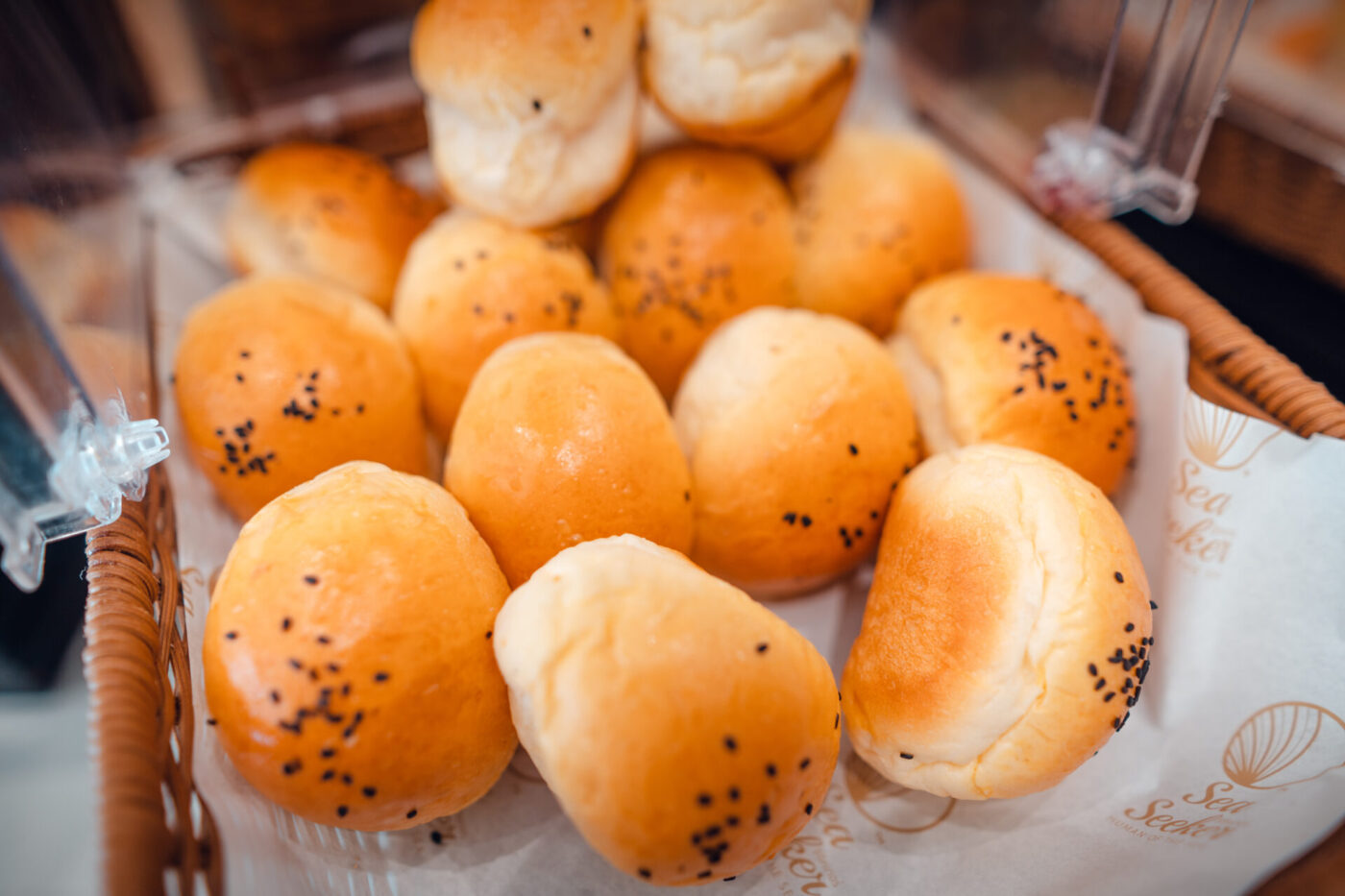 Fresh baked dinner rolls in bakery