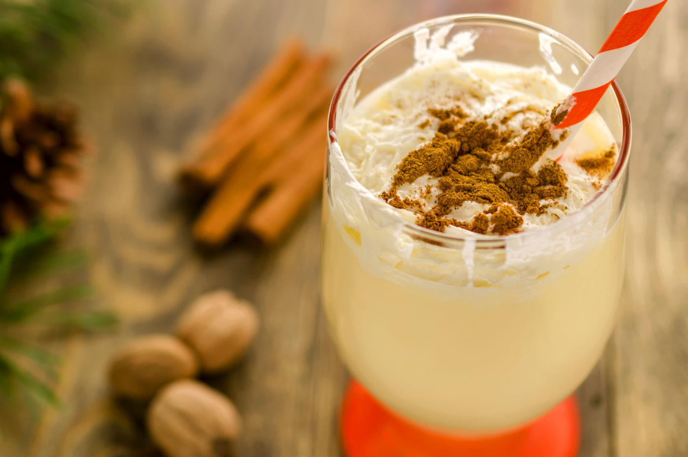 Top view of the eggnog in glass with orange leg