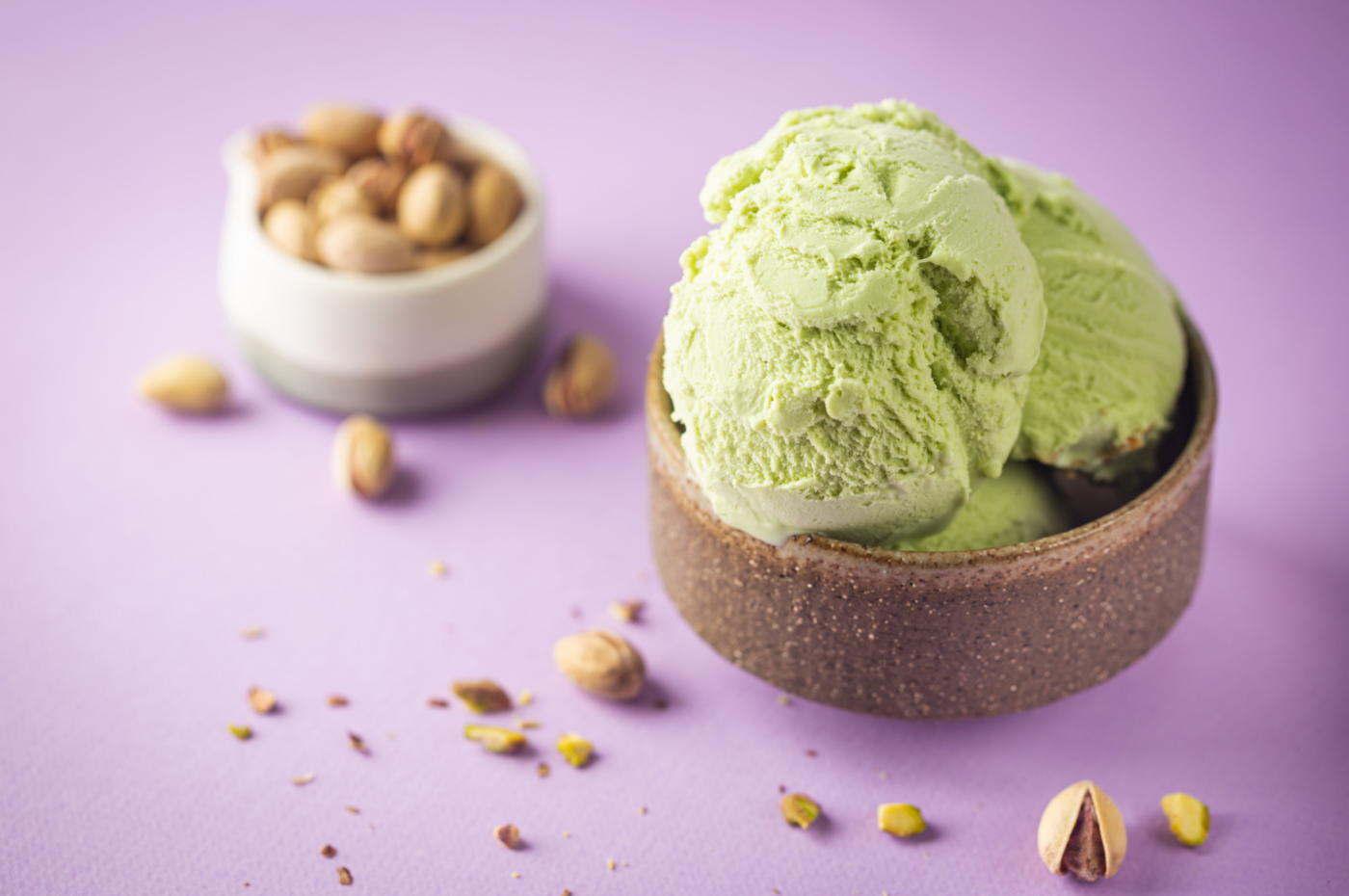 Pistachio ice cream in the small bowl